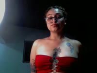 A woman with a hypnotic presence, an intense gaze, and a soft yet commanding voice. Every movement she makes exudes control and desire. Her elegance and poise inspire respect and fascination; she knows exactly how to combine seduction and power, turning submission into an art form.